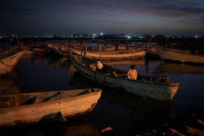 AP PHOTOS: Desperate for new lives, they took to the sea