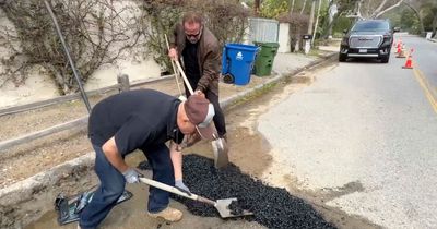 Arnold Schwarzenegger repairs potholes on Los Angeles road after becoming 'upset'