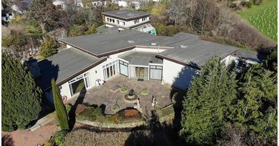 Beverly Hills style Edinburgh mansion with throwback features and 'floor bath' hits market