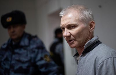 Belarus extradites father of Russian girl who drew anti-war pictures