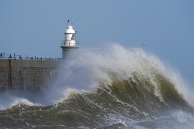 Search under way for person in sea as Storm Noa powers through England and Wales