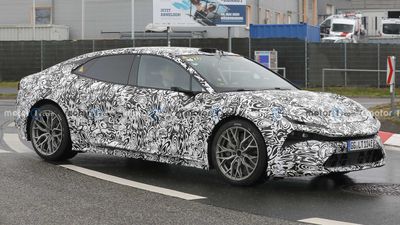 Lotus Electric Sedan Spied Hiding Eletre-Inspired Design In New Photos