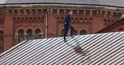 Inmate climbs onto roof of notorious Strangeways prison as negotiators called in
