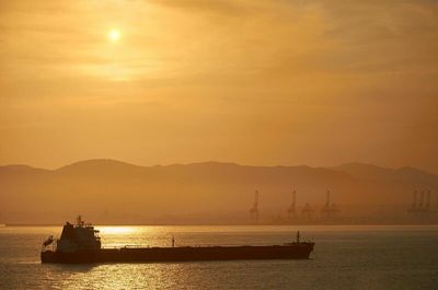 Crude Prices Settle Higher on Shrinking Global Oil Supplies