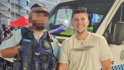 NSW Police Issue Statement After Cop Poses W/ Man Wearing Gay Slur T-Shirt At The Easter Show
