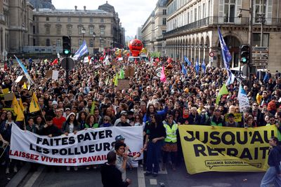 French unions rally supporters to the streets ahead of pension ruling