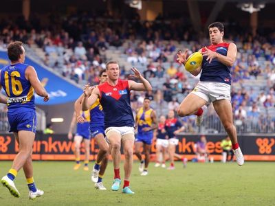 Demons on the march, crush West Coast in AFL mismatch