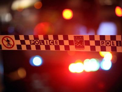 Woman found dead in home unit, man assisting detectives
