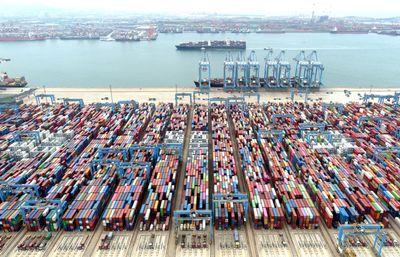 China's exports rise unexpectedly, but economists warn of weakness ahead