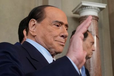 Doctors: Italy's Berlusconi continues to improve in ICU