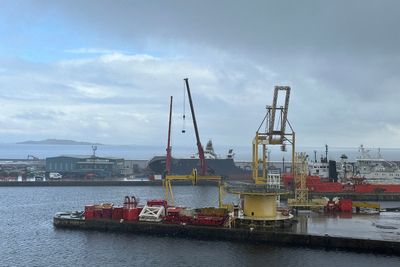 Cranes on site as investigations continue at dry dock where vessel toppled over