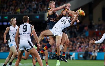 Adelaide Crows open AFL Gather Round with upset win over Carlton