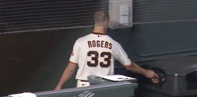 Giants pitcher Taylor Rogers threw his glove in the trash and punched the bench in a fiery tantrum