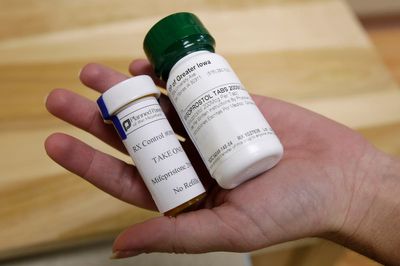Abortion providers scramble as courts restrict pills