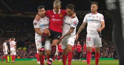 Man Utd's Lisandro Martinez carried off by Argentina teammates after worrying injury