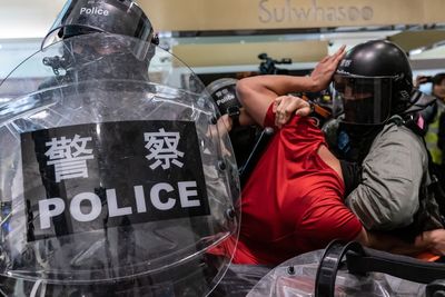 Kiwi police work with Hong Kong force accused of brutality