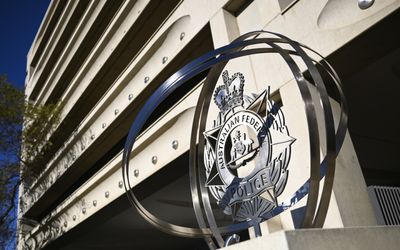 Man charged over embassy bomb threats