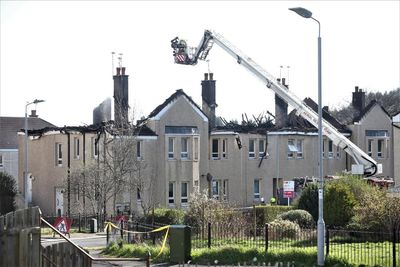 Woman dies after 999 crews called to fire