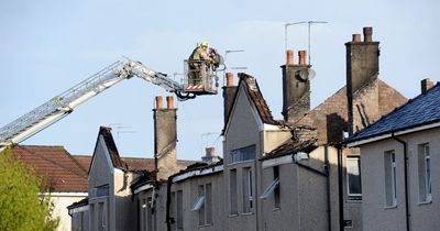 Paisley fire tragedy as woman dies after devastating blaze rips through flats in overnight horror