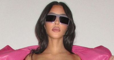 Kim Kardashian narrowly avoids wardrobe malfunction in tiny crop top for sexy campaign