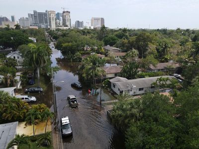 Airport looks to open as South Florida floods slowly recede