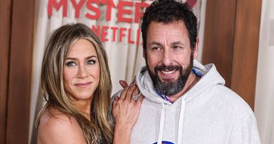 Jennifer Aniston and Adam Sandler stunned by reporter's height in hilarious video