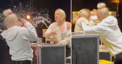 OnlyFans star Elle Brooke throws water at rival to spark chaotic brawl during face-off