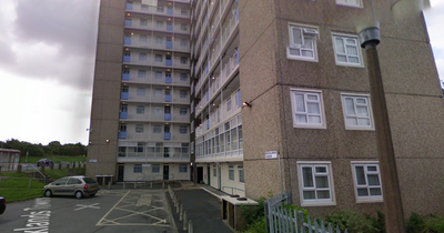 Police issue statement and launch investigation as man found injured in Leeds block of flats dies