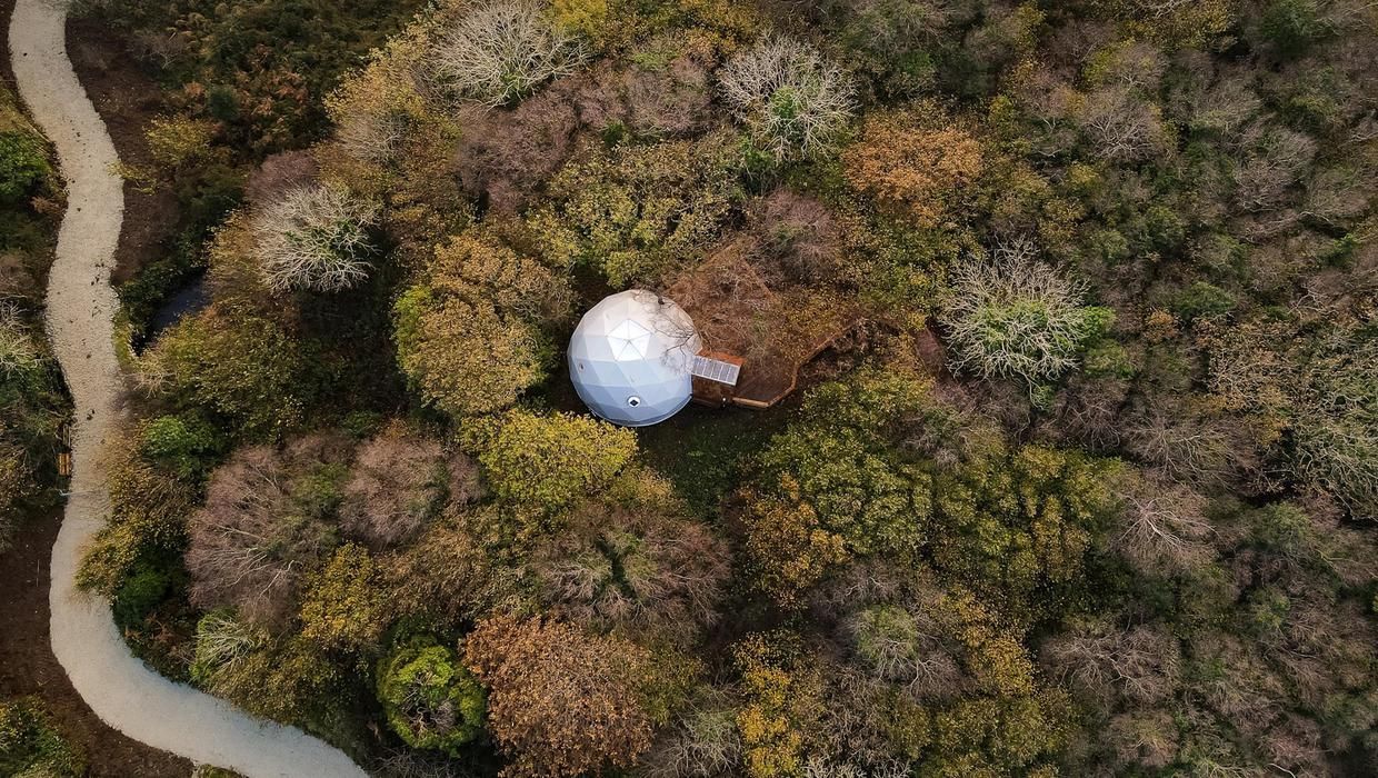 We built a treehouse dome and stilt house for guests…