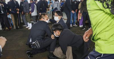 Japan Prime Minister evacuated as panicked onlookers flee with explosion heard at speech