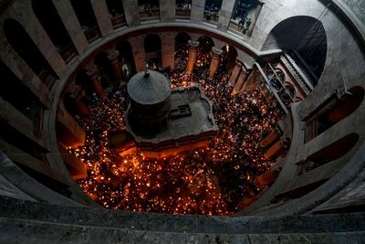 Watch live: Christians mark Holy Saturday with candlelit vigil in Jerusalem