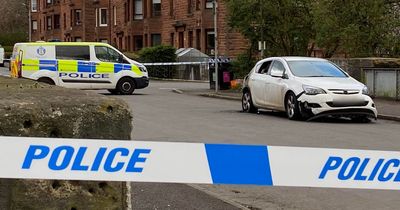 Glasgow street cordoned off as police probe deliberate car fire in Riddrie