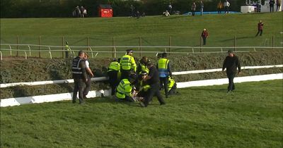 Grand National delayed after animal rights protestors break on to racecourse