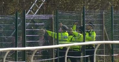 Grand National delayed after protestors gain entry to Aintree race course