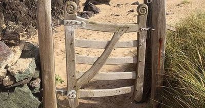 The fantastical 'Narnia' gate leading to a stunning Welsh beach