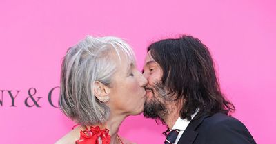 Keanu Reeves snogs girlfriend in red carpet PDA amid fear he's 'married to A-list star'