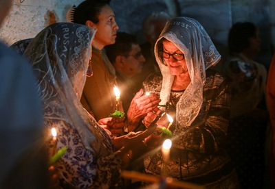 Despite Israeli restrictions, Christians celebrate Holy Flame