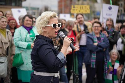 Police form line between rival transgender debate demos in Belfast