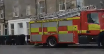 Edinburgh firefighters tackle blaze above local pub as two residents taken to hospital