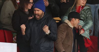 Wrexham owners Rob McElhenney and Ryan Reynolds celebrate first promotion