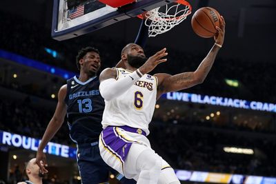 Lakers surge late for NBA win, Memphis injury scare for Morant