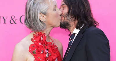 Keanu Reeves snogs girlfriend on red carpet despite 'marriage to top actor'