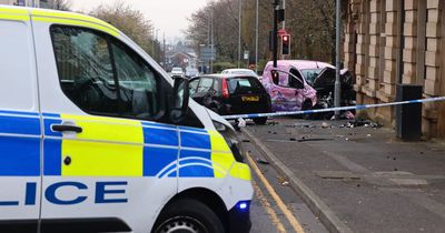 Two women injured after van smashes into building