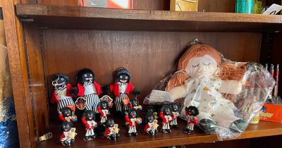 Café sparks disgust over display of dozens of racist golly dolls despite complaints