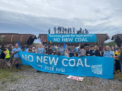 Climate activists arrested after dumping coal off cargo train in Australia