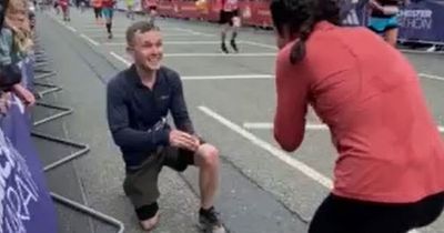Heartwarming moment man proposes to girlfriend before they cross finish line together at Manchester marathon
