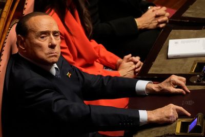 Berlusconi's treatment for infection continues in hospital