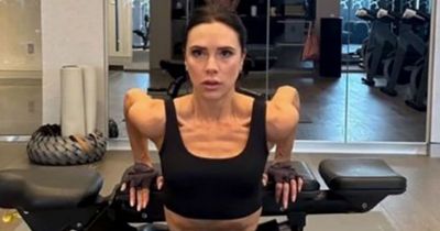 Victoria Beckham shows off muscles in gym - but fans spot naked David in mirror