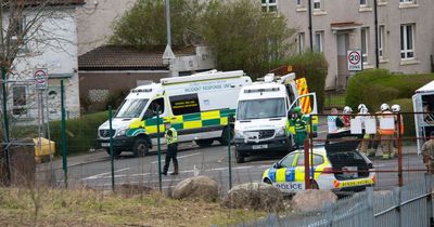 Bomb squad pictured on Glasgow street after 'suspicious device' found