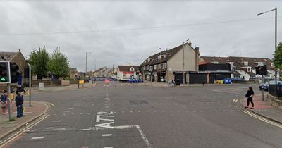 Edinburgh armed police lock down busy local street in ongoing incident